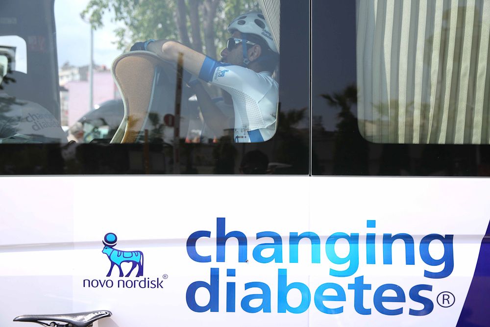 A Novo Nordisk rider relaxes on the team bus.