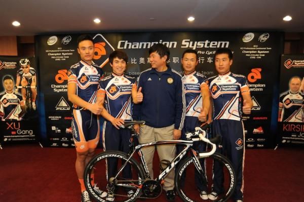 Hong Kong Cycling's Coach Shen (center) poses with Champion System Pro Cycling Team Chinese riders (left to right) Xu Gang, Jiao Pengda, Jiang Kun and Liu Biao.