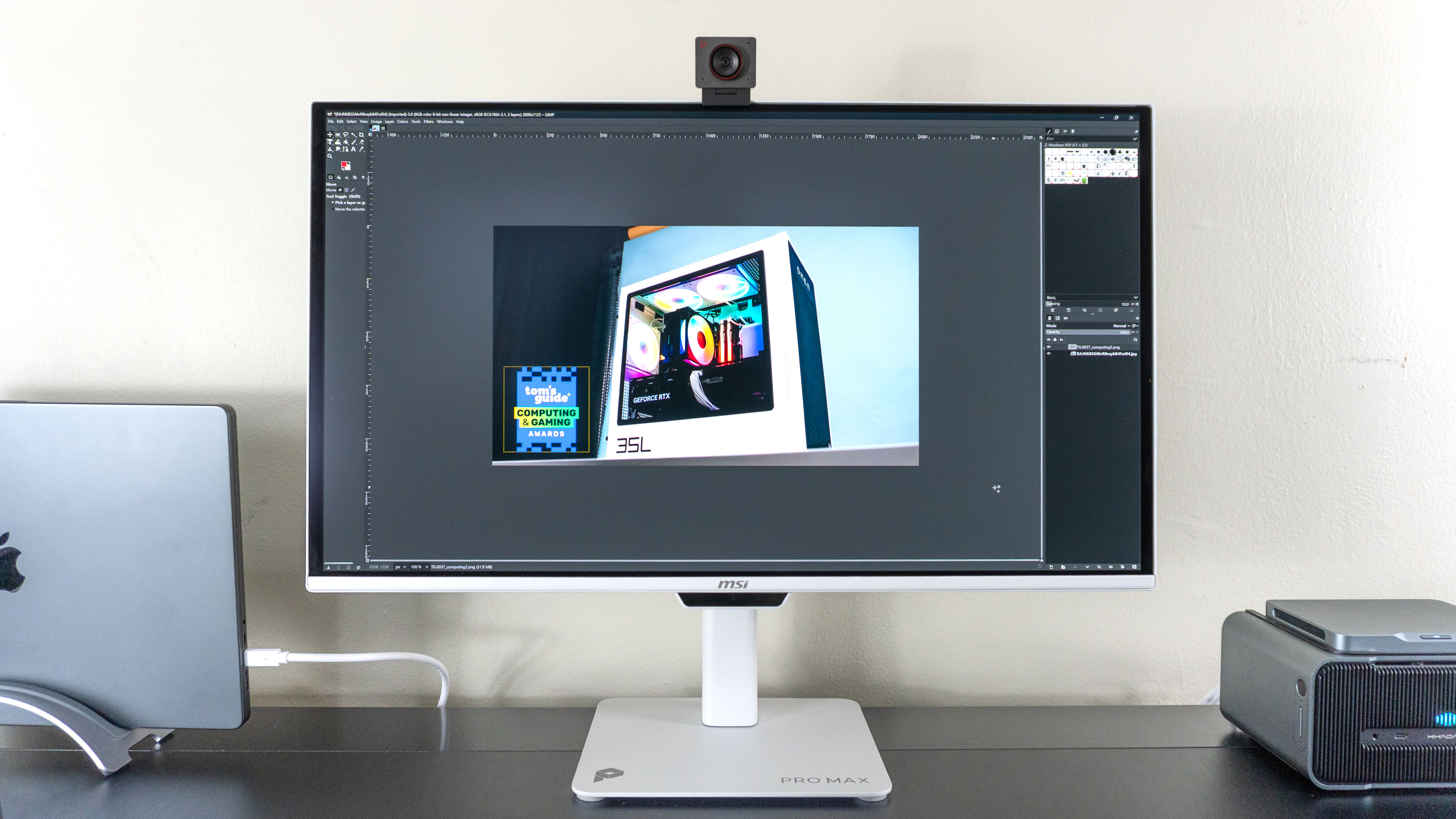 The MSI Pro Max 271UPXW12G monitor running GIMP to edit photos