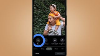 A phone screen containing a photo of a man and child