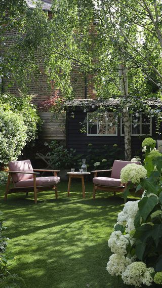 how to create an eco-friendly garden: a relaxed seating area in a shady garden