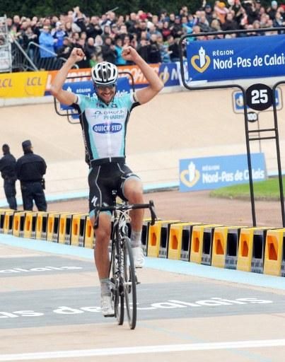 Tom Boonen (Omega Pharma-QuickStep) celebrates his fourth victory in Paris-Roubaix.