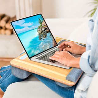 lady with laptop and sofa