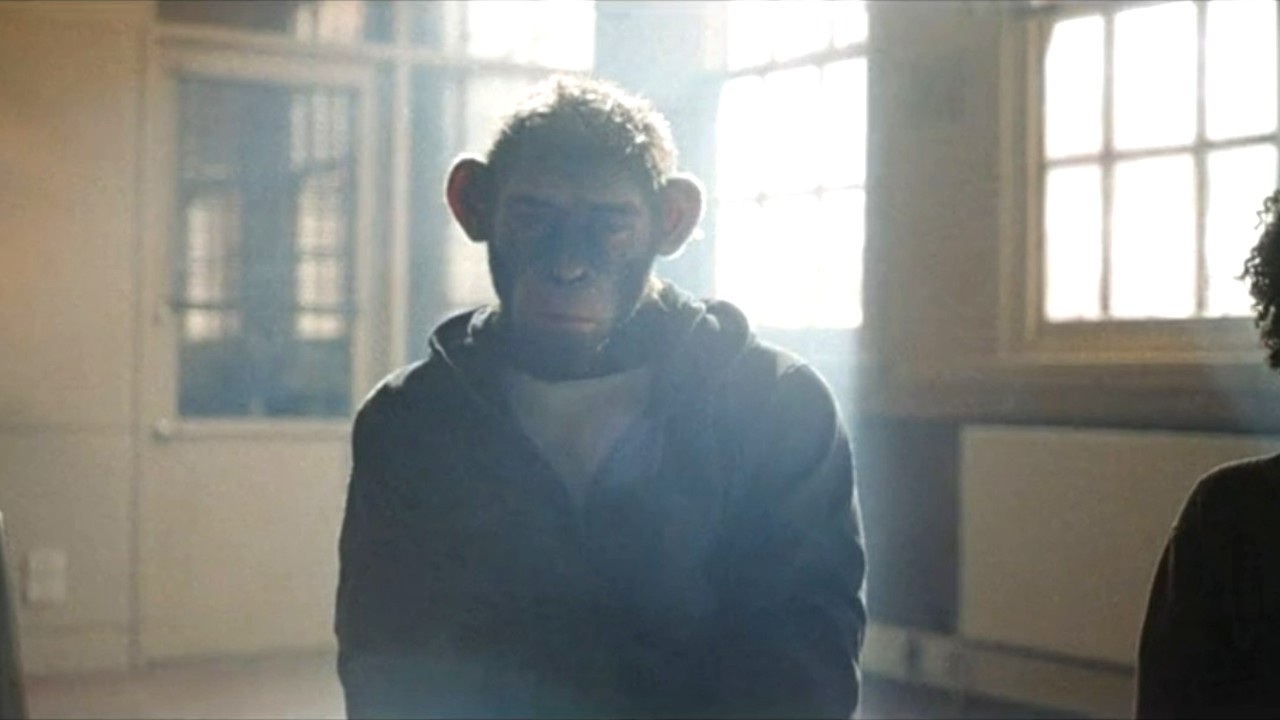 Monkey Robbie Williams looking sad in rehab in Better Man.