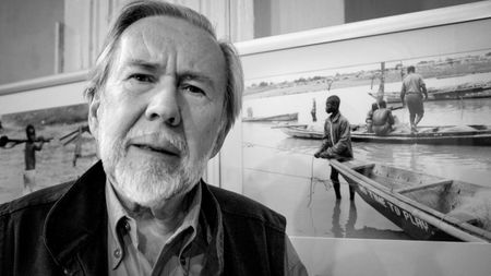 Magnum Photos' British photographer Ian Berry poses in front of his exibition "Ghana's Disposable Children" during the 19th International Festival of Photojournalism/Visa pour l'Image, 06 September 2007 in Perpignan.