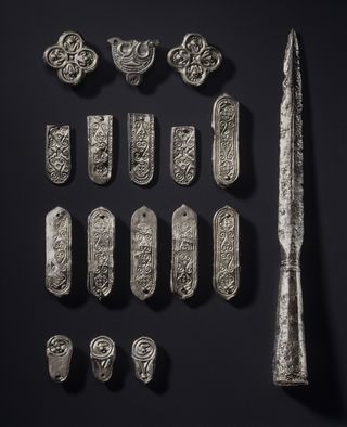 An ornamented double-edged sword and armor from the Longobards (also known as Lombards, a Germanic group) that archaeologists found in grave 6.