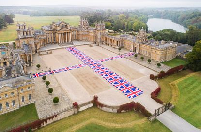 Aerial view of Blenheim Palace with Union Jack flags