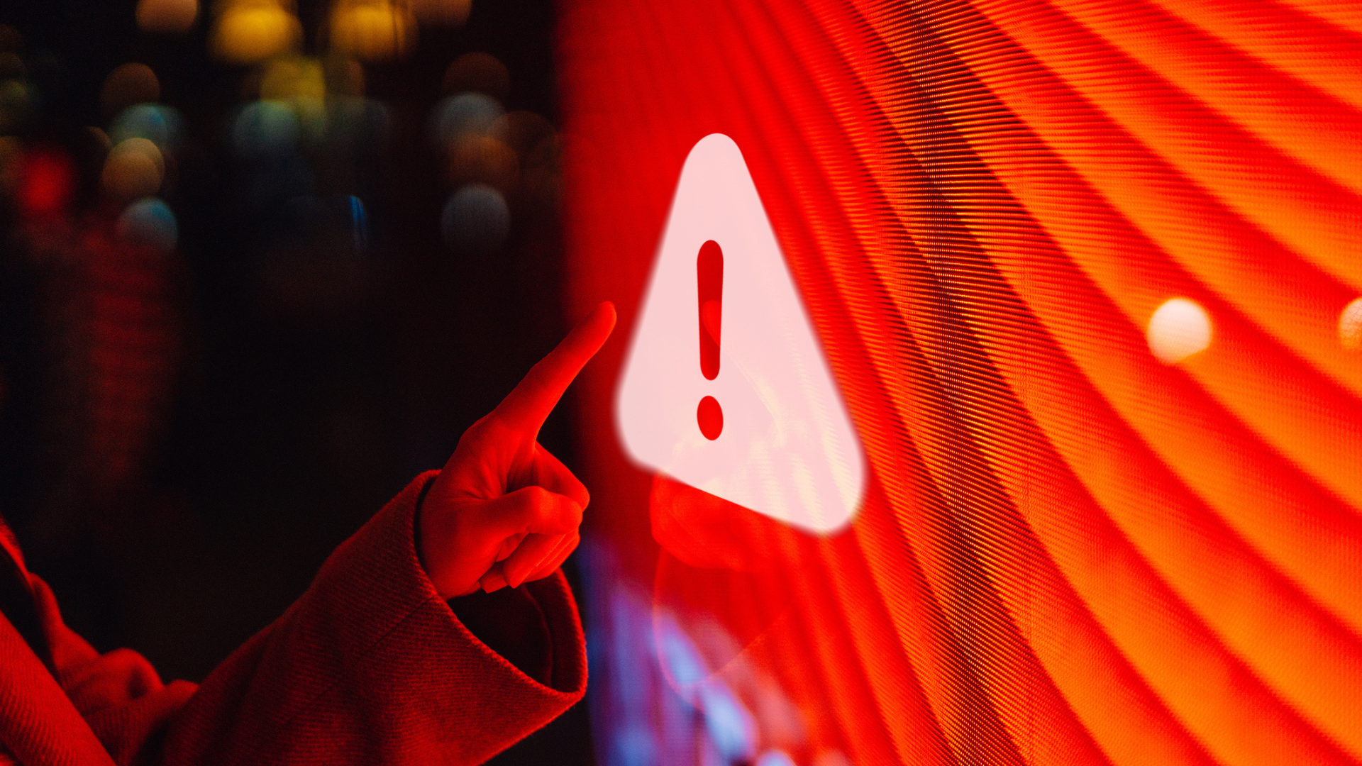 a red alert sign on a screen