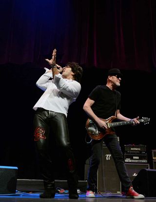 Singer Terry Ilous (L) and guitarist Mark Kendall of Great White perform during The 5th annual Vegas Rocks! Magazine Music Awards at The Pearl Concert Theater at the Palms Casino Resort on November 23, 2014