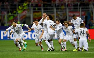 Real Madrid players celebrate victory on penalties against Atletico Madrid in the 2016 Champions League final.