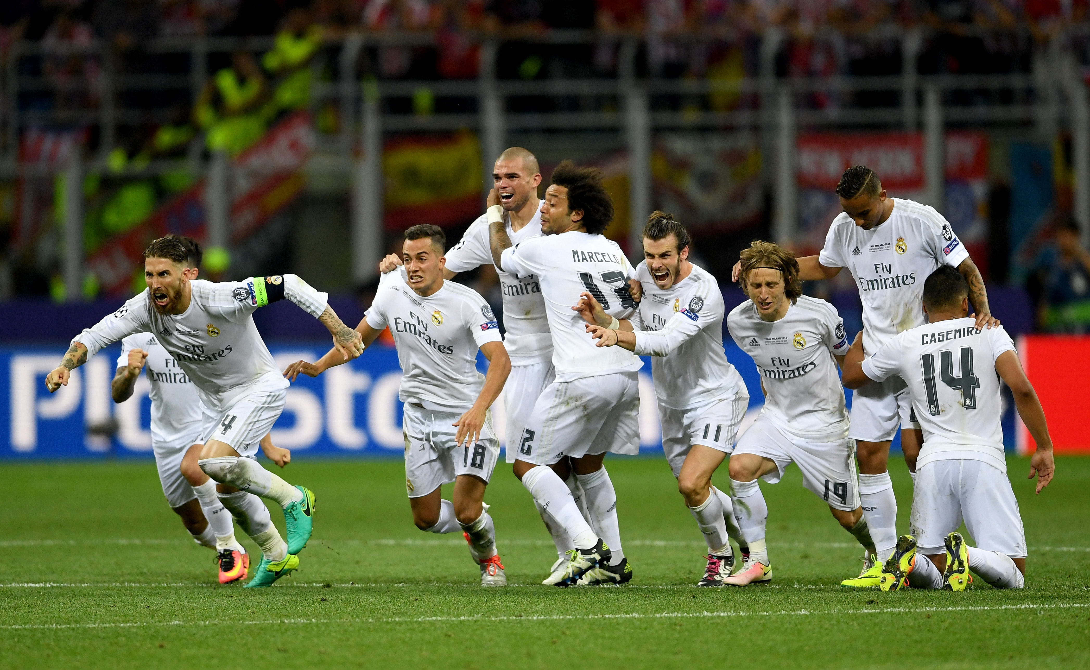 Real Madrid players celebrate victory on penalties against Atletico Madrid in the 2016 Champions League final.