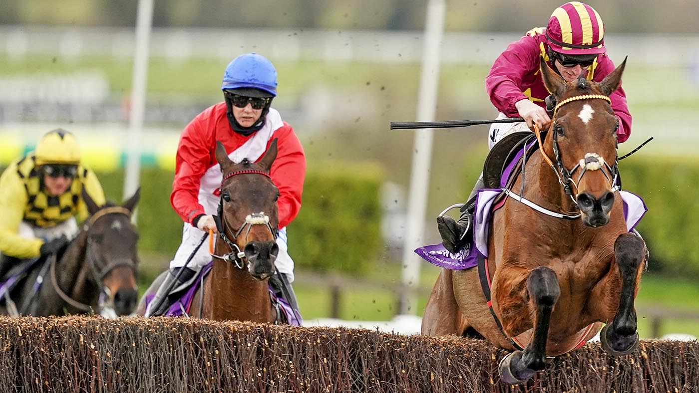 Jockey Jack Kennedy rides on Minella Indo to take first place ahead of second-placed jockey Rachael Blackmore on A Plus Tard (C) and third-placed jockey Paul Townend on Al Boum Photo during the WellChild Cheltenham Gold Cup Chase race on Day Four of the Cheltenham Festival at Cheltenham Racecourse, in Cheltenham, England on March 19, 2021. (Photo by Alan Crowhurst / POOL / AFP) (Photo by ALAN CROWHURST/POOL/AFP via Getty Images)
