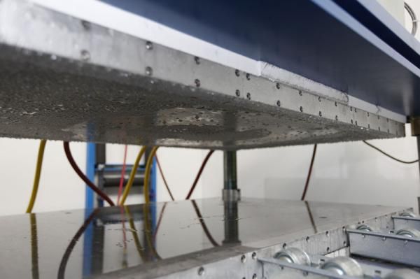 After the heating and curing process, molds are transferred to another station where the temperature is brought down gradually.