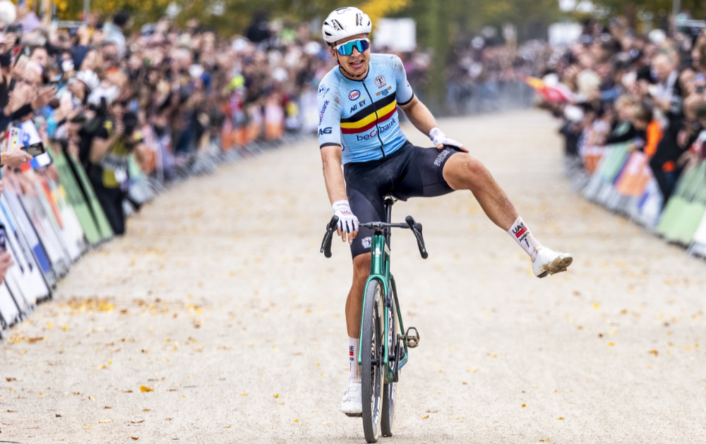 Forian Vermeersch celebrates winning the men's elite race cycling event as part of the UCI Gravel World Championships in Maastricht, on October 12, 2025. 