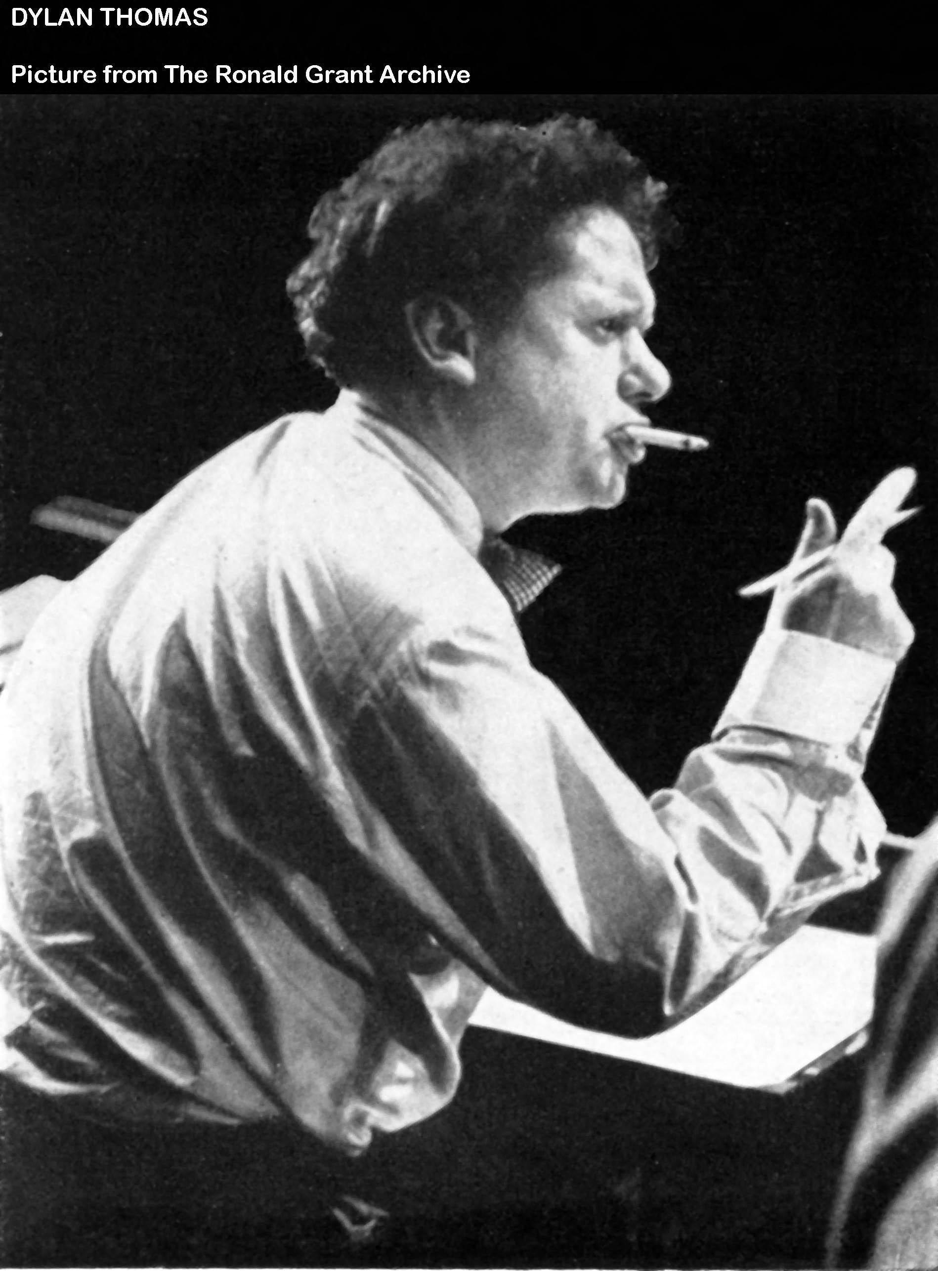 Dylan Thomas points with a pen in his hand