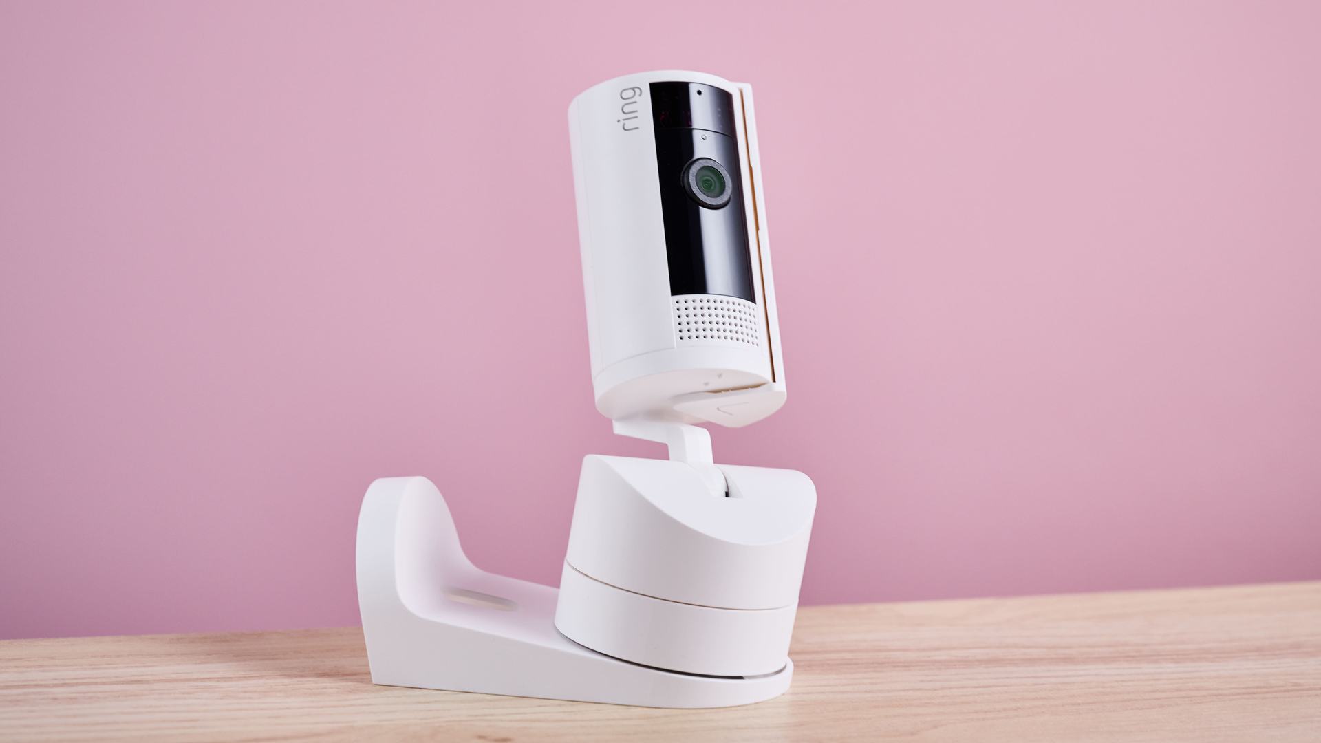 The Ring Pan-Tilt Indoor Cam is shown attached to the wall and ceiling mount.