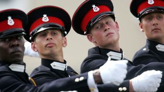Prince Harry marches on parade at Royal Military Academy