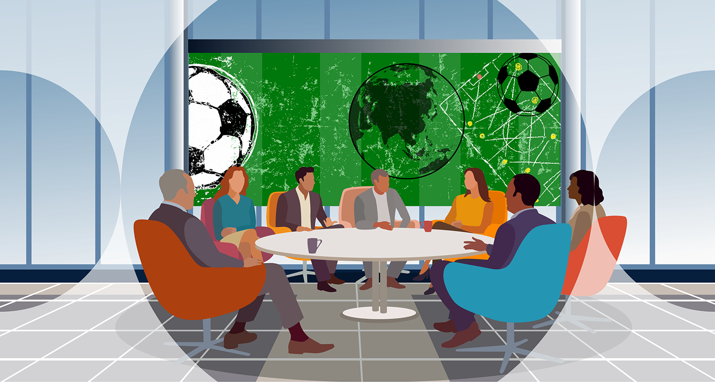 Team discussion with football and global background