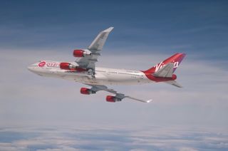 Virgin Orbit's Cosmic Girl carries a LauncherOne booster in a captive-carry flight on April 12, 2020. The company plans to launch its first test flight in May 2020.