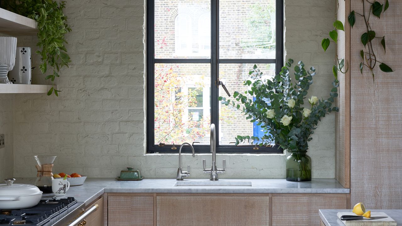 Wooden kitchen with green walls