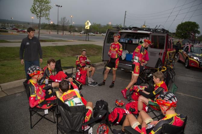 The 5hr Energy team relaxes in the last traces of daylight following their tough effort in Saturday's 114-mile wet and cold road race. The team led the chase of the breakaway over the final circuit.
