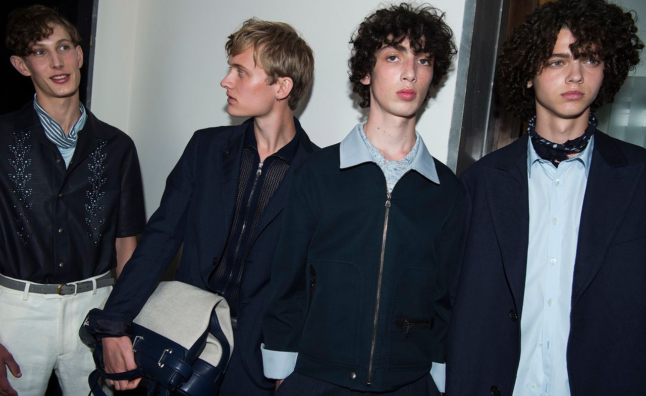 Males models wearing blue jackets and shirts from the Salvatore Ferragamo S/S 2018 collection