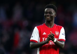 Arsenal’s Bukayo Saka at the final whistle following the Premier League match at the Emirates Stadium, London. Picture date: Saturday February 19, 2022