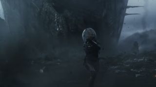 Charlize Theron as Meredith Vickers running from a rolling spacecraft in Prometheus