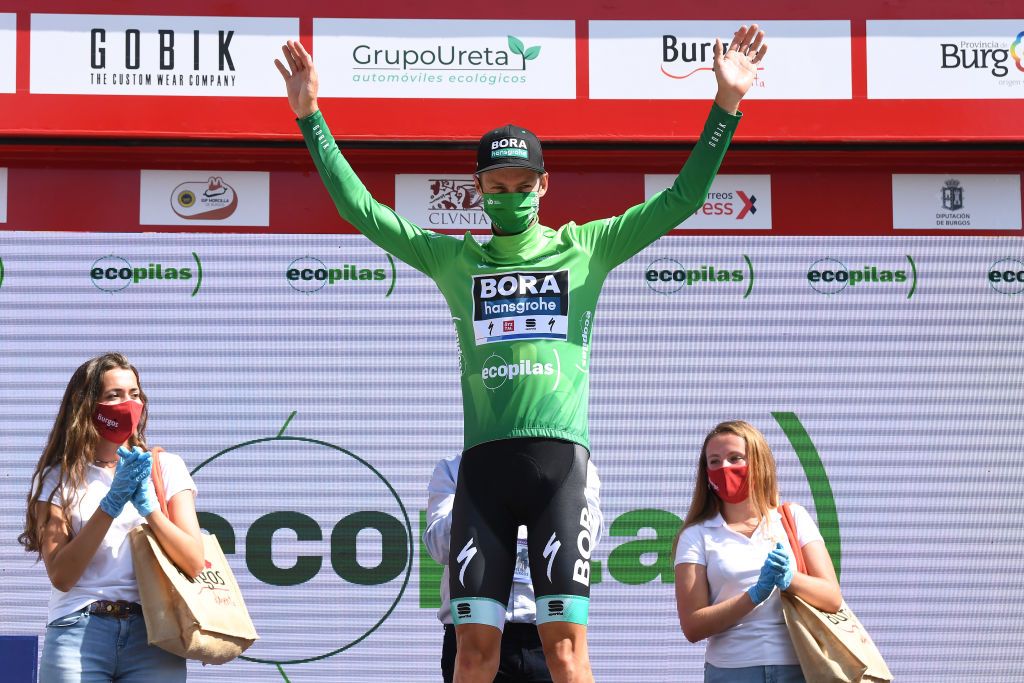 VILLADIEGO SPAIN JULY 29 Podium Felix Grossschartner of Austria and Team BoraHansgrohe Green Points Jersey Celebration Hostess Miss during the 42nd Vuelta a Burgos 2020 Stage 2 a 168km stage from Castrojeriz to Villadiego VueltaBurgos on July 29 2020 in Villadiego Spain Photo by David RamosGetty Images