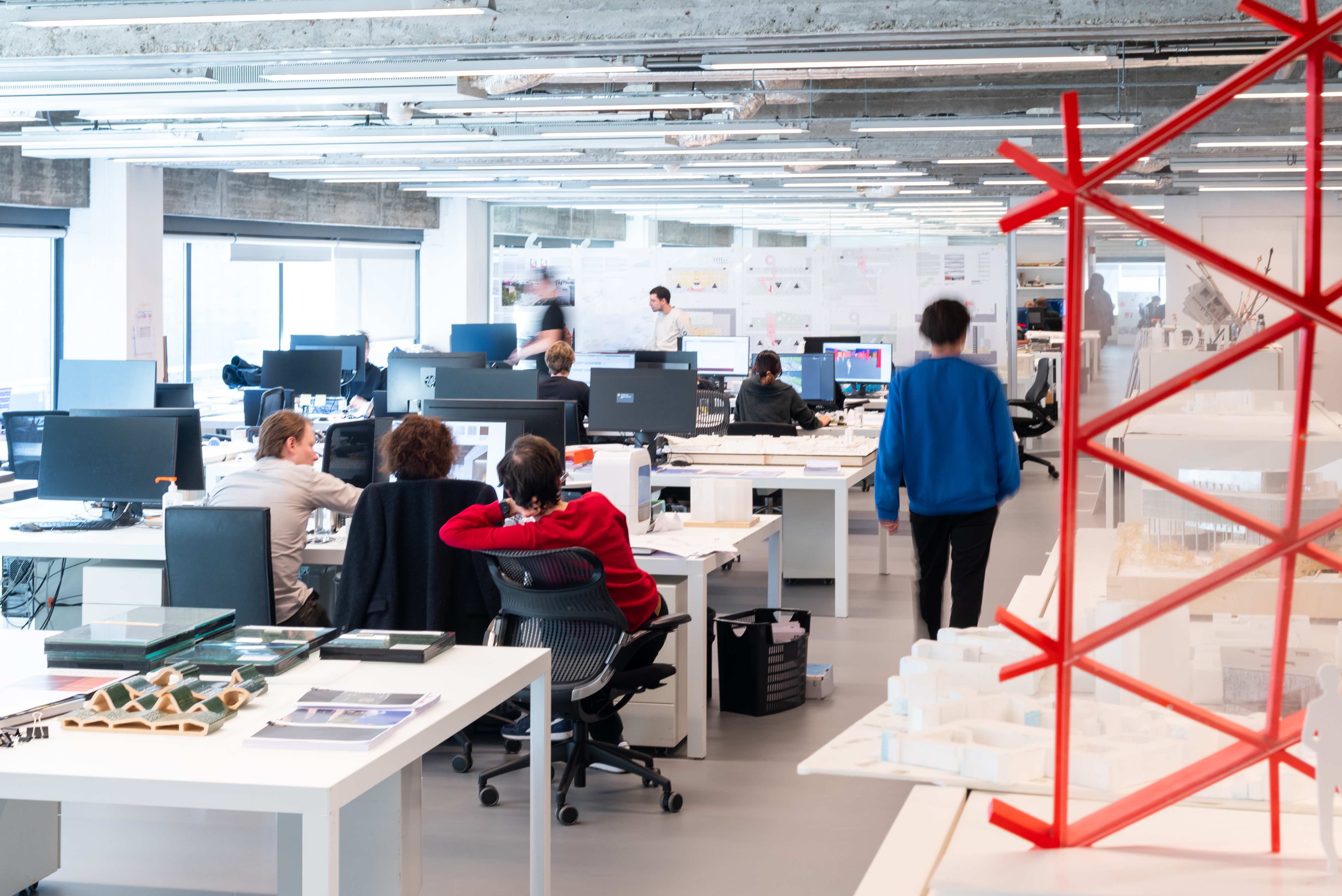 interior of OMA Rotterdam office with people sat at desks, working