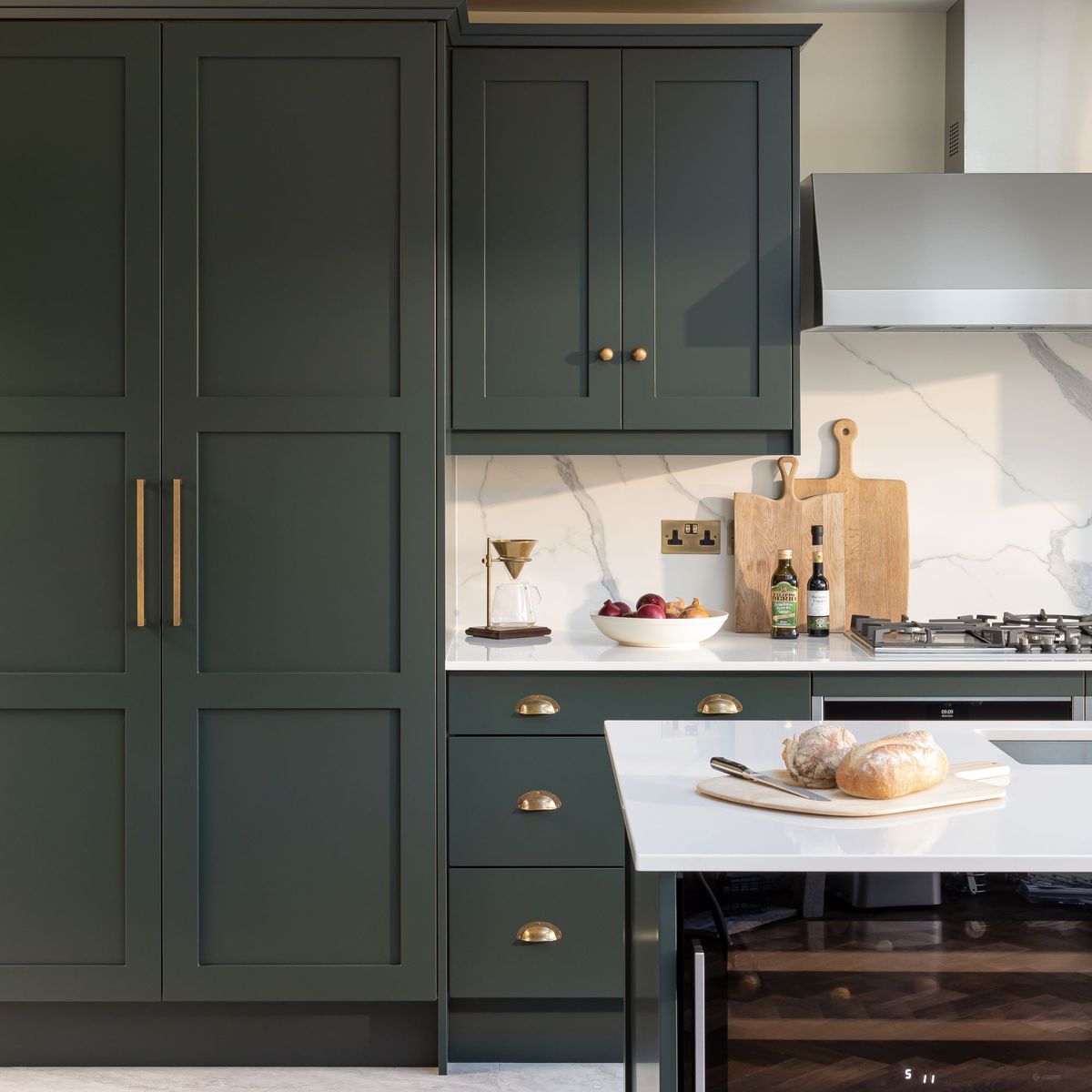 A light-starved space has been swapped for a daring green kitchen ...