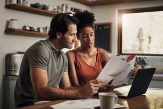 couple looking at paperwork