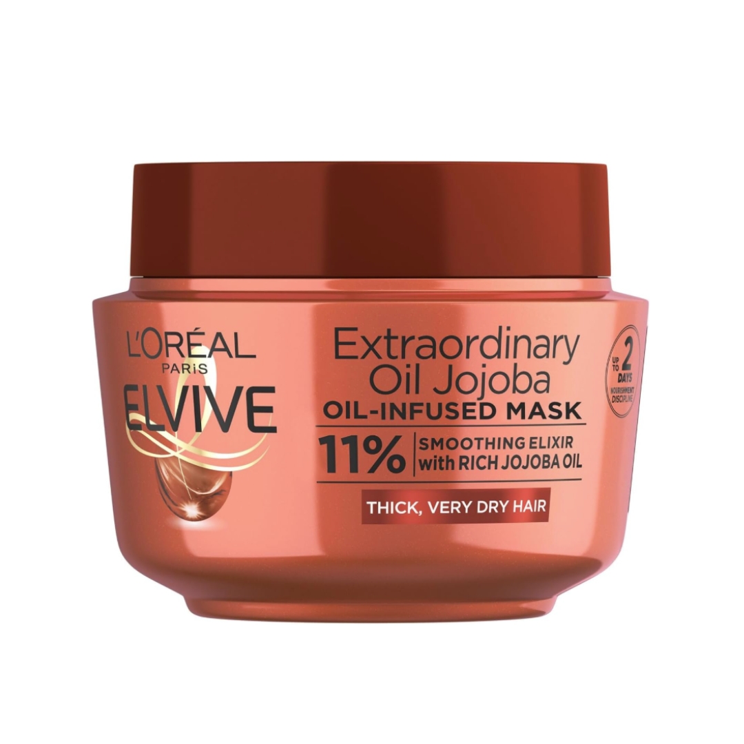 A product shot of the L'Oreal Paris Extraordinary Oil Mask, on a white background