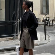 woman wearing shorts and blazer
