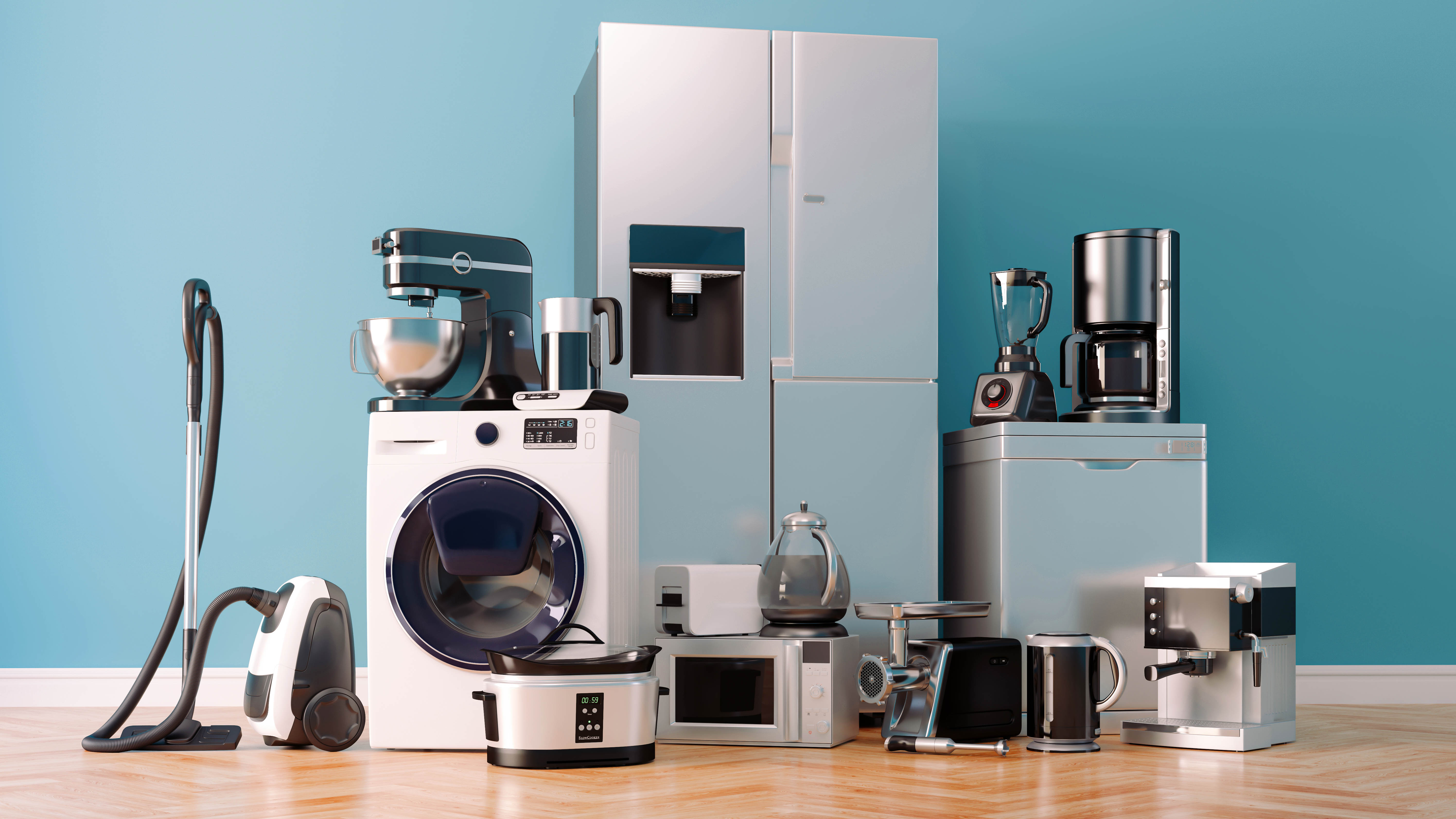 An assortment of appliances sitting on the floor, including a washing machine, fridge freezer, stand mixer, vacuum cleaner, dishwasher, microwave and coffee maker