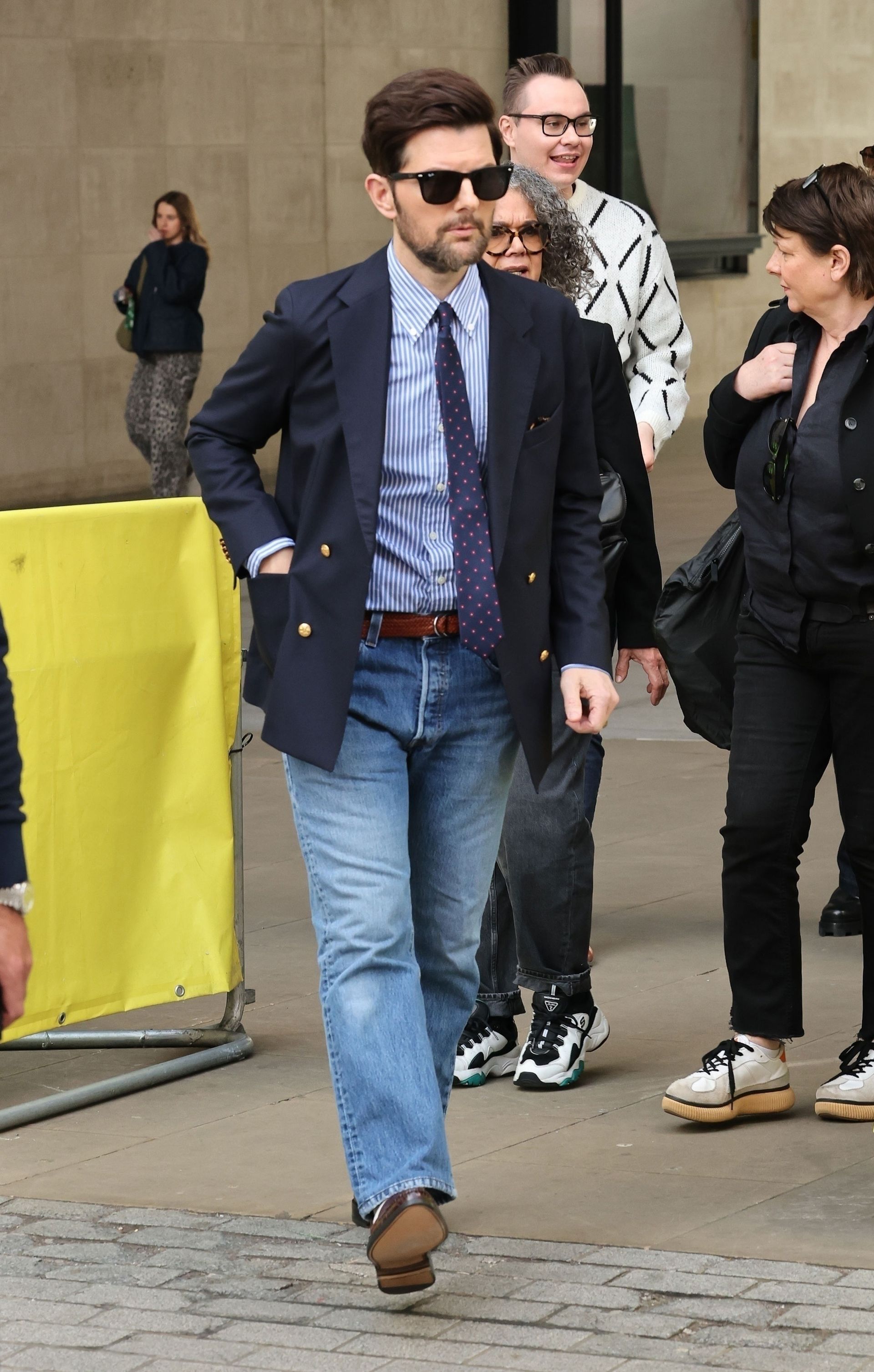 Adam Scott wears a blazer with jeans on a Severance press tour in London