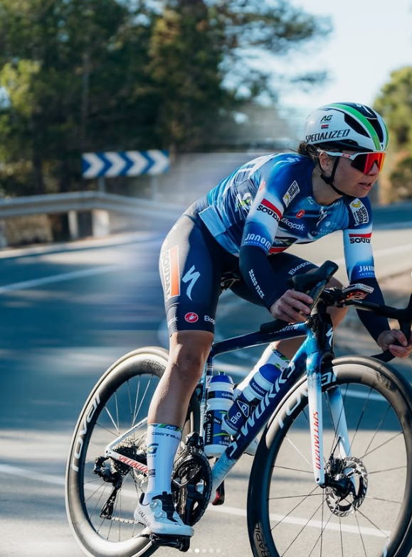 An ag insurance soudal rider descending in the drops