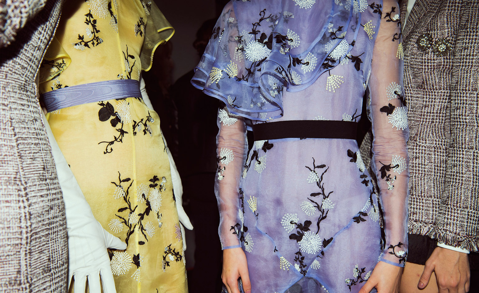 There were sophisticated bell-shaped overcoats cut in floral jacquards and embellished with sparkling gem buttons