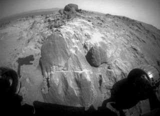 NASA's Mars rover Opportunity is taking a close look at the strange flat-faced rock near the center of this view, captured on March 3, 2015.