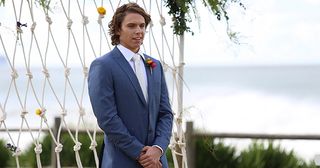 VJ Patterson looks at his bride Billie Ashford walk down the aisle to him in Home And Away.