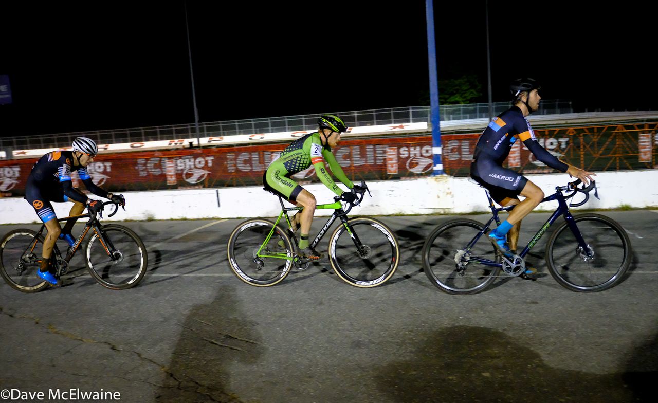 Danny Summerhill (Maxxis Shimano) sitting up on the track with Curtis White up the road