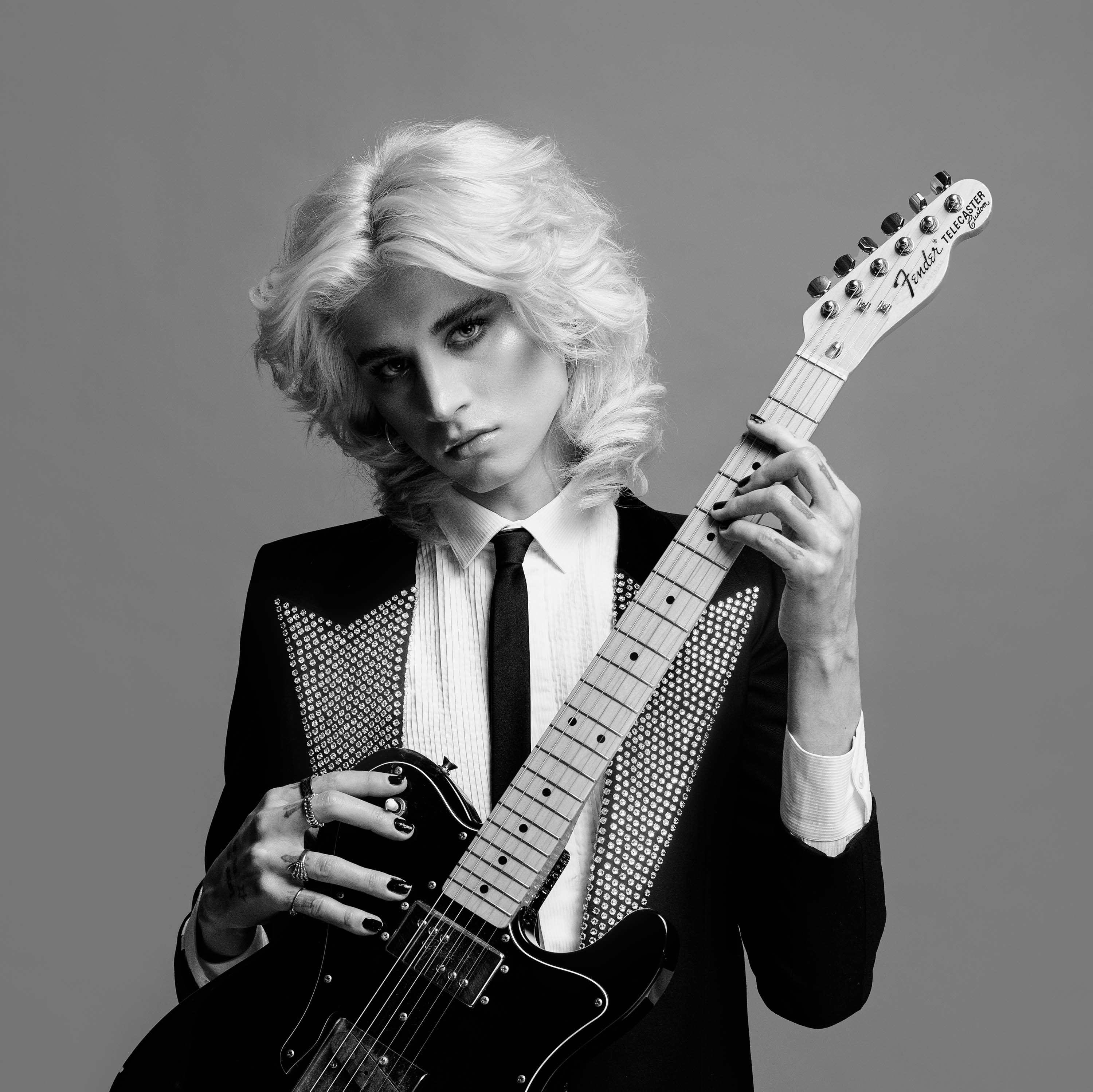 Wavvyboi holding a Fender Telecaster