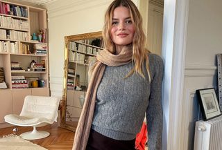 French women in gray sweater.