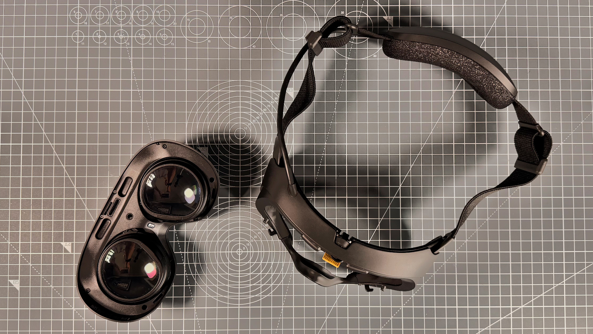 The Steam Frame with the core module, containing the processor, cooling, cameras and more, removed from the strap.