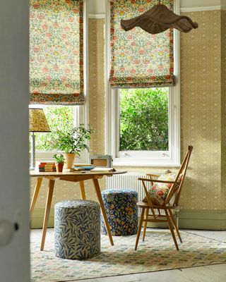 Dining area with Arts & Crafts Morris & Co wallpaper and blinds