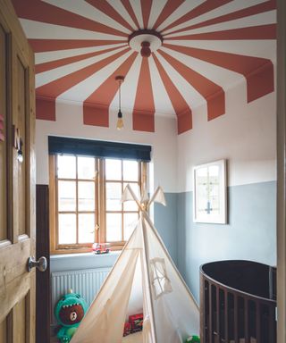 red and white stripe circus ceiling in kids bedroom nursery