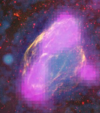 Fermi's LAT mapped GeV-gamma-ray emission (magenta) from the W44 supernova remnant. The features clearly align with filaments detectable in other wavelengths. This composite merges X-rays (blue) from the Germany-led ROSAT mission, infrared (red) from NASA's Spitzer Space Telescope, and radio (orange) from the NRAO's Very Large Array near Socorro, N.M.
