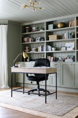 Sage green home office with Ikea Sektion cabinets and DIY shaker doors by Semi Handmade