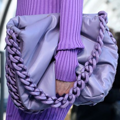  A model, vegan leather bag detail, walks the runway during the Stella McCartney Womenswear Fall/Winter 2022-2023 show as part of Paris Fashion Week at Centre Pompidou on March 07, 2022 in Paris, France