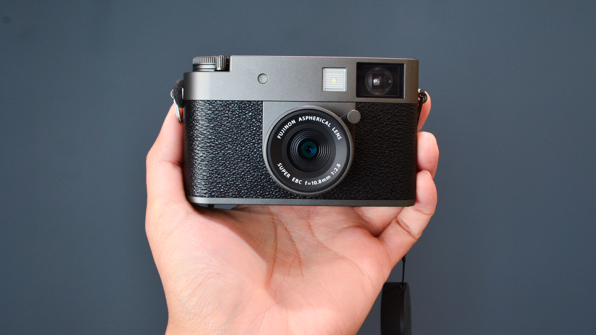 A charcoal Fujifilm X half digital film camera
